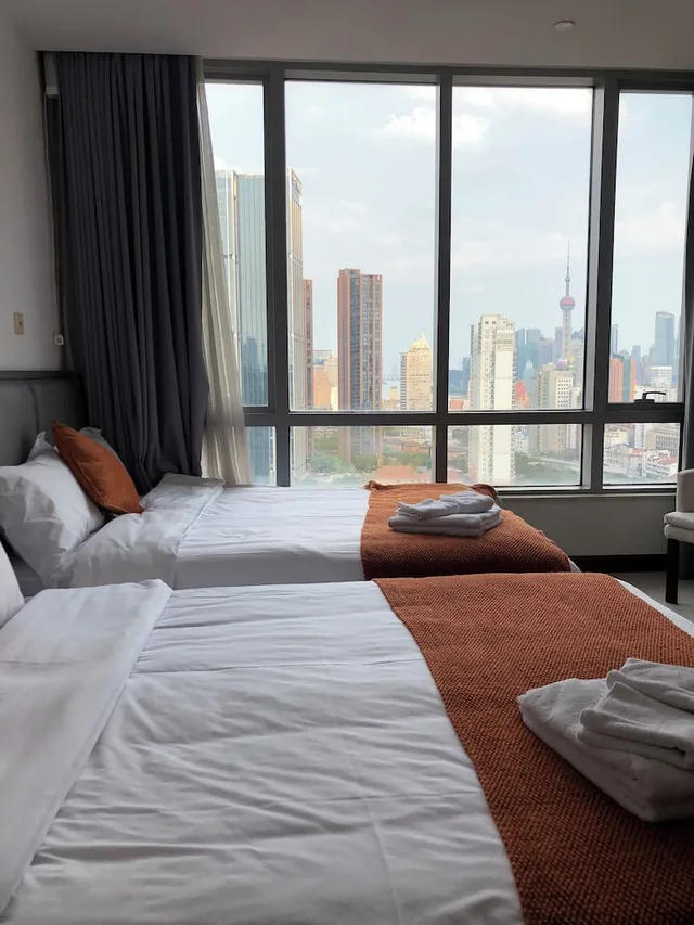 شقة سكنية سوبيريور بسريرين كينج وسريرين كوين بإطلالة على المدينة، River House Near Peoples Square And The Bund 3/10