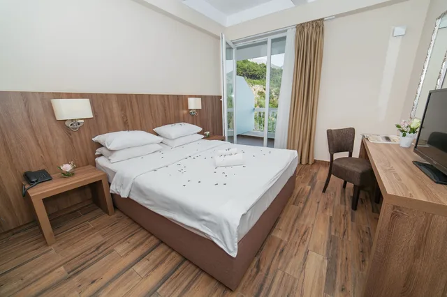2 Bedrooms, Panoramic, Suite, 1 Single and 2 Double Beds, Sea View, Terrace، Sato Conference and Spa Hotel 1/5