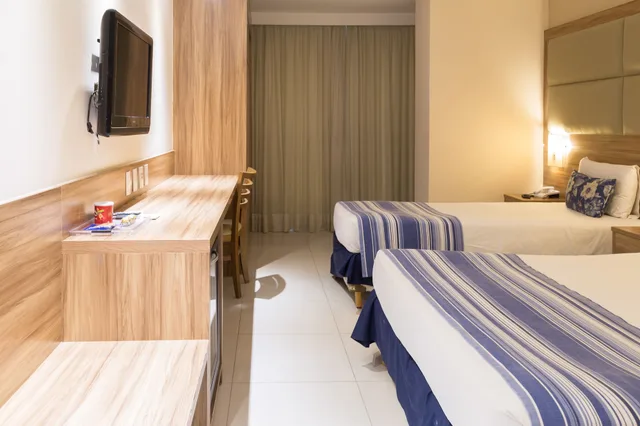 غرفة فاخرة ثلاثية بسرير مزدوج وسرير فردي، Hotel Atlantico Praia 1/4