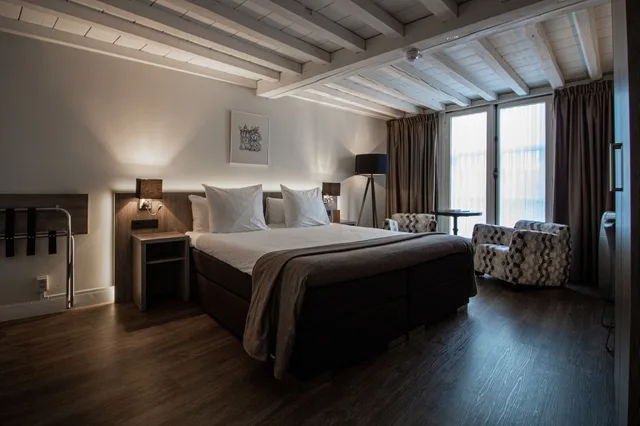 غرفة غراند ديلوكس بسرير كوين، Grand Hotel De Draak and Residence Dagmara 1/6