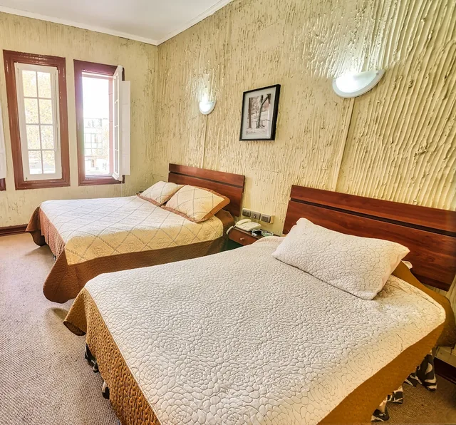غرفة قياسية ثلاثية بسرير مزدوج وسرير فردي، Si Hotel 4/5