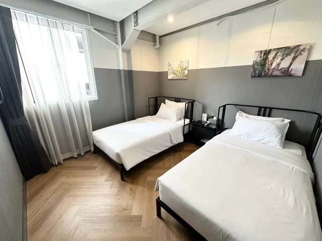 غرفة بسريرين منفصلين بحمام خاص، Talakkia Boutique Hotel 1/4
