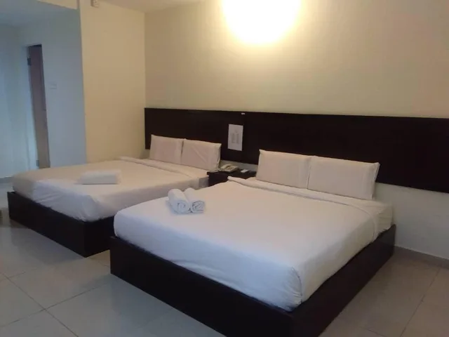 غرفة سوبيريور ديلوكس بسريرين كوين، Hotel Mewah Impiana 1/3
