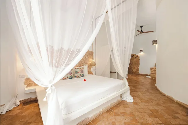 غرفة ديلوكس ثلاثية بسرير كينج وسرير فردي بإطلالة على الحديقة، Mvuvi Boutique Resort 3/10