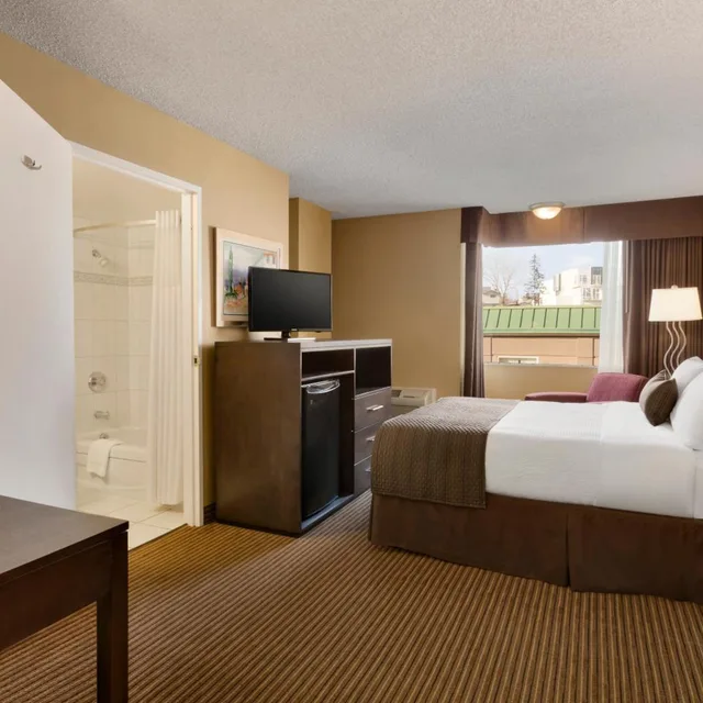 Room, King Bed, Queen Bed, Accessible, Days Inn by Wyndham Calgary South 1/8