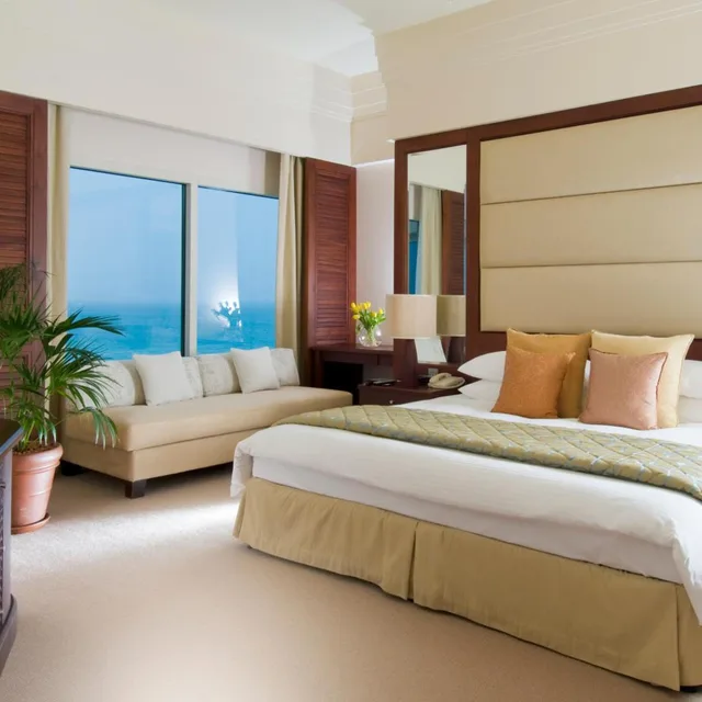 جناح تنفيذي بإطلالة على البحر بمنطقة جلوس، Danat Jebel Dhanna Resort 1/6