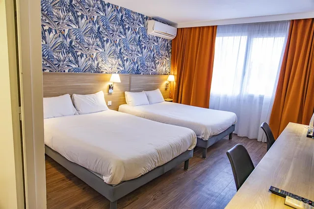 غرفة عائلية بسريرين مزدوجين، Golden Tulip Troyes 1/5