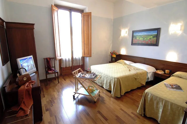 غرفة رباعية بسرير مزدوج وسريرين منفصلين، Palazzo Vecchio Hotel 3/10