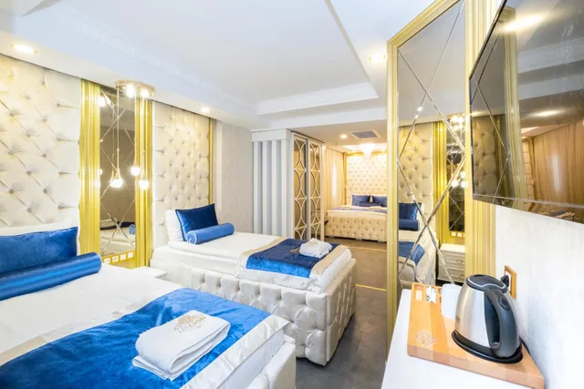 غرفة رباعية بسرير مزدوج بإطلالة، Les Lion Luxury hotel & spa 1/2