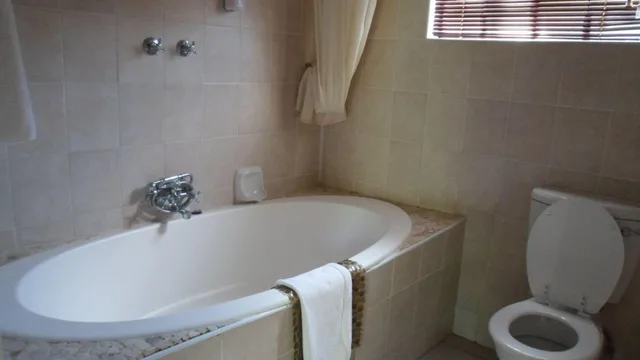 شقة عائلية بسرير كينج بإطلالة على الحديقة مع أريكة بمطبخ صغير، Queness Inn 2/6