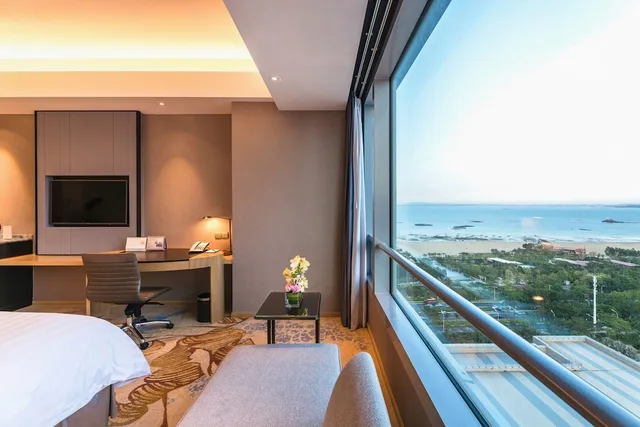 غرفة ديلوكس بسرير كينج بإطلالة على البحر، Shangri La Xiamen 7/10