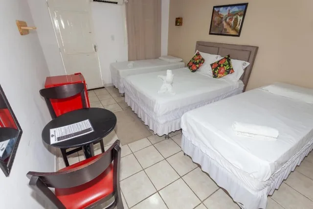 غرفة قياسية ثلاثية بسرير مزدوج وسرير فردي، Pousada Villa Goya 1/2