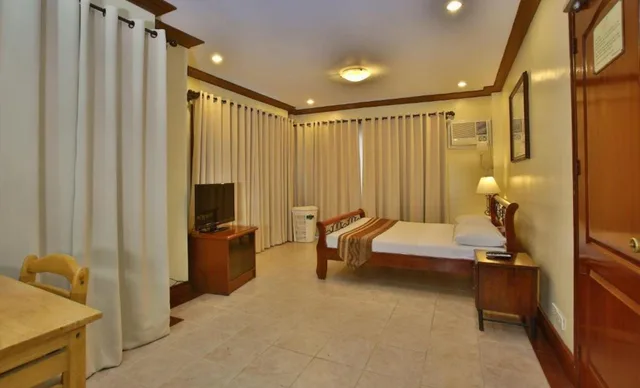 فيلا بسريرين مزدوجين مع أريكة، Crown Regency Suites Mactan 1/2