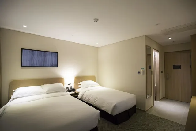 غرفة قياسية بسرير مزدوج وسرير فردي بإطلالة على المدينة، Best Western Haeundae Hotel 3/6