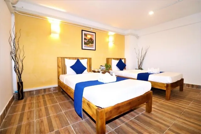 غرفة بسريرين منفصلين بحمام مشترك، Grand Elevation Hotel 2/10