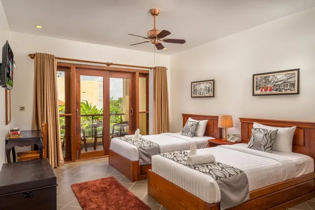 غرفة متصلة عائلية بسرير كينج وسريرين منفصلين بشرفة، Savada Angkor Boutique Hotel 1/1