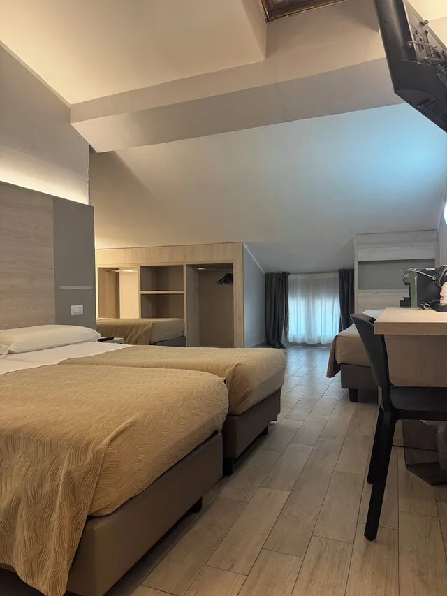 غرفة رباعية، Hotel Miramonti 1/4