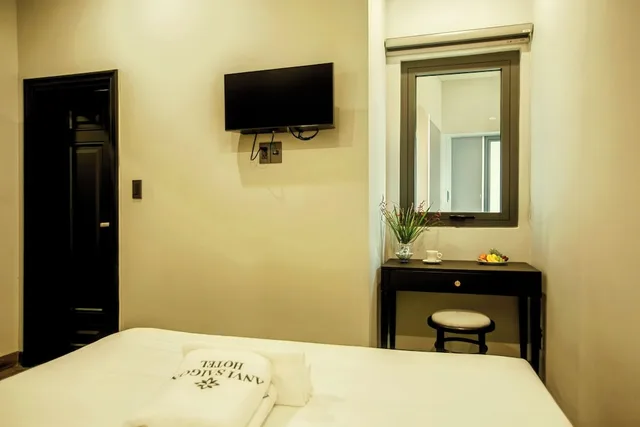 غرفة ديلوكس بسرير كوين، Anvi Saigon Boutique Hotel 5/9