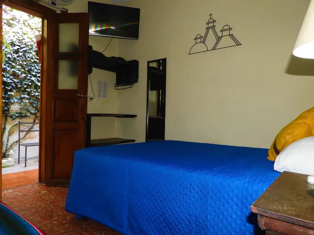 غرفة أساسية بسرير مزدوج وسرير فردي، Hostal Antigua - Hostel 4/5
