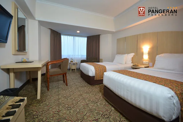 غرفة ديلوكس بسريرين منفصلين بغرفتي نوم، Hotel Pangeran Pekanbaru 3/7