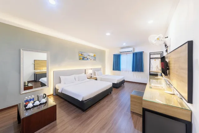 غرفة ديلوكس عائلية بسرير كوين وسرير فردي، A25 Hotel - 35 Mac Thi Buoi 7/10