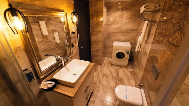 غرفة ديلوكس بسرير كينج وسرير كوين مع أريكة، Mas Suites Nisantasi 5/5
