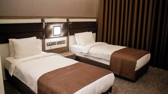 غرفة ديلوكس بسريرين منفصلين بإطلالة على المدينة، Modernity Hotel 1/3