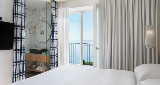 غرفة قياسية بسريرين منفصلين بإطلالة على البحر بشرفة، Bluesun Hotel Jadran 5/6