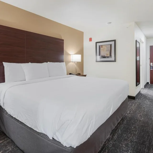 غرفة، Cobblestone Hotel & Suites - Two Rivers 1/10