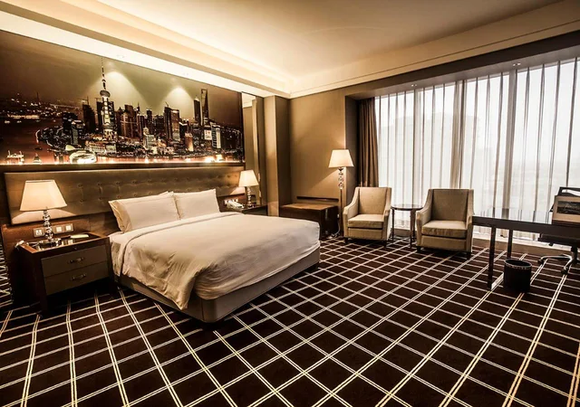 غرفة ديلوكس بسرير كينج وسرير كوين، ROYAL CENTURY HOTEL SHANGHAI 1/6