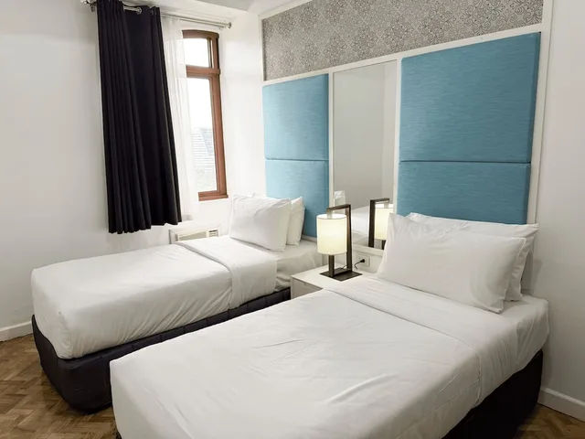 غرفة عائلية بسرير كوين وسرير فردي بغرفتي نوم، Parque Espana Residence Hotel 1/3