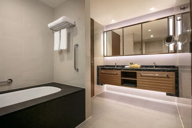 غرفة ديلوكس بسرير كينج وسريرين منفصلين بغرفتي نوم، SOMERSET SWAN LAKE HEFEI 6/6