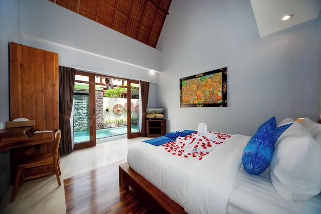 غرفة بسرير فردي بإطلالة على المسبح، Kusuma Living and Villa Seminyak 1/7