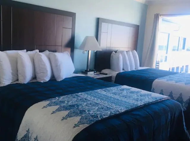 غرفة قياسية بسريرين كوين لذوي الإعاقة، DOLPHIN COVE MOTEL 1/5