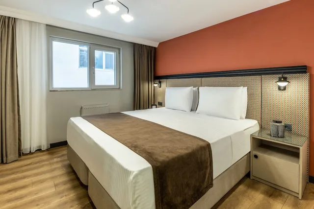 شقة اقتصادية بسرير كينج بغرفة نوم واحدة مع أريكة، BayMari Suites City Life 2/3