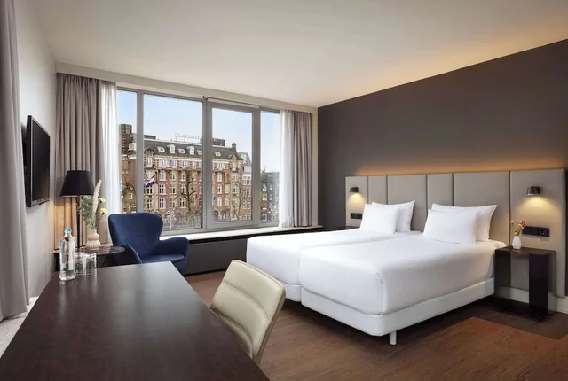 غرفة سوبيريور بسرير مزدوج مع سرير إضافي بإطلالة، NH Amsterdam Caransa 2/7