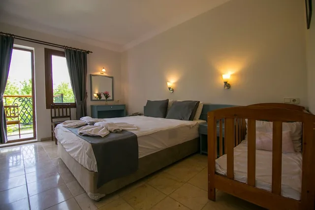 غرفة قياسية ثلاثية بسرير كوين وسرير فردي، Kilim Hotel 5/10