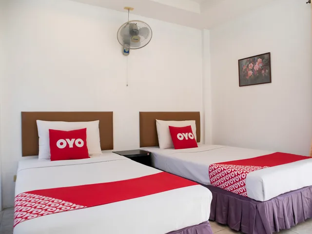 غرفة قياسية بسريرين منفصلين، OYO 325 Naiyang Cottage 1/4