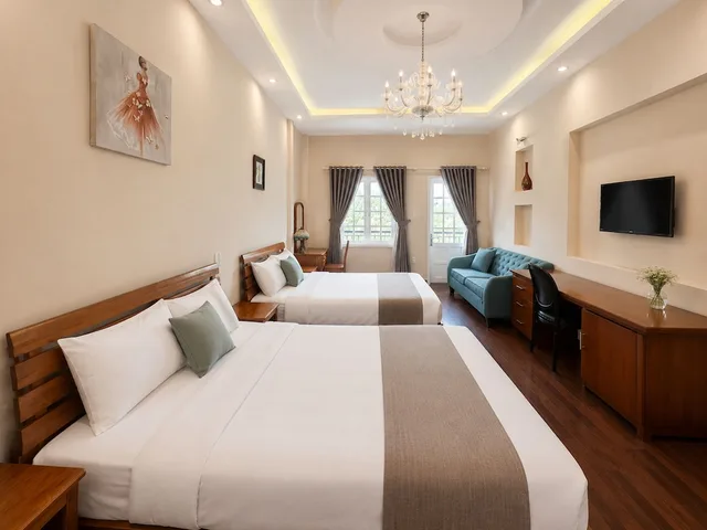 جناح عائلي بسرير كينج وسرير فردي مع أريكة، Terrasse Des Roses 4/10