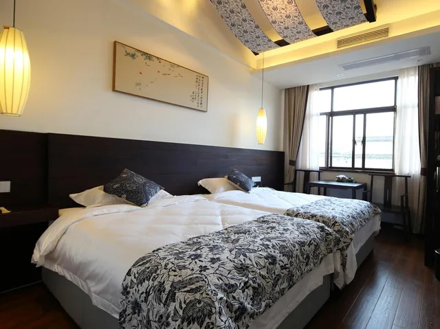 Delight, Twin Beds، Tongxiang Wuzhen Yuexiang Inn 1/1
