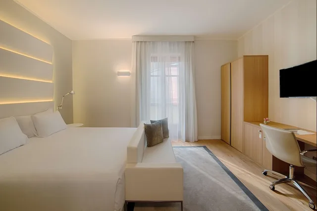 غرفة بريميوم بسرير كينج بشرفة، NH Collection Torino Santo Stefano 4/7