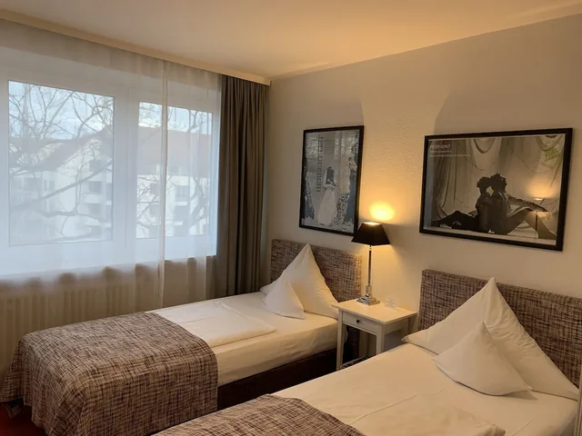 غرفة ثلاثية بسريرين منفصلين بإطلالة على المدينة مع أريكة، Hotel Nymphenburg City 10/10