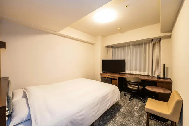 غرفة قياسية مفردة بسرير مزدوج في الملحق للمدخنين، Richmond Hotel Sendai 1/2
