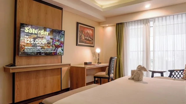 جناح جونيور بسرير كينج بشرفة، Grand Sunshine Resort and Convention 3/4