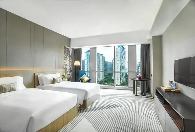 غرفة ديلوكس بسريرين منفصلين، Poly Yueya Hotel 2/2