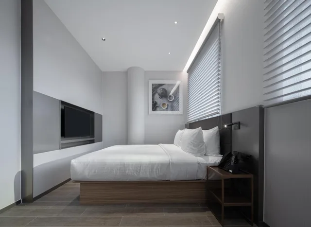 Deluxe, Double Bed, No Window، Meichen Hotel 3/8