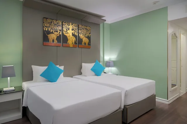 جناح جونيور عائلي بسريرين منفصلين وسرير كينج وسرير فردي، Memoire Siem Reap Hotel 1/3