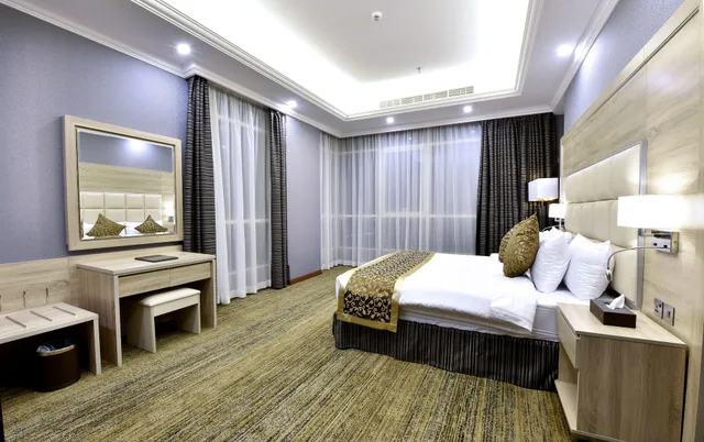 جناح جونيور بسرير كينج بإطلالة على المدينة مع أريكة، فندق إيريديوم 70(Iridium 70 Hotel) 2/3
