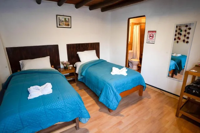 غرفة بسريرين منفصلين بحمام خاص، Hostal Teatro Inka 3/4