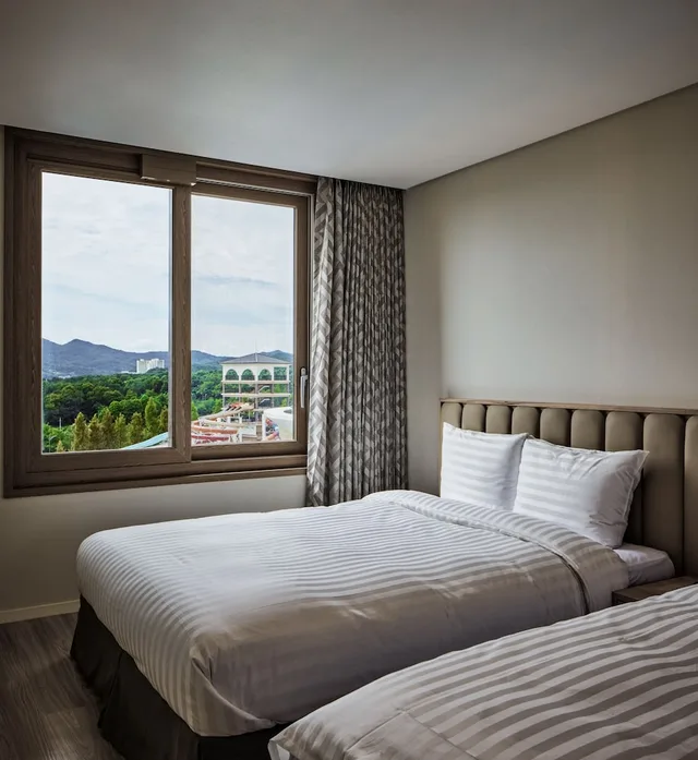 Water, Suite, Triple, 1 Single and 2 Double Beds, Kitchen, East Tower، SONO BELLE CHEONAN 1/4